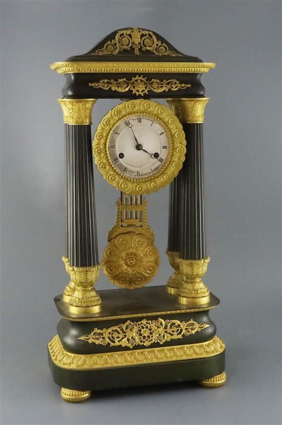 A mid 19th century French bronze and ormolu portico clock, width 12.5in. depth 7.75in. height 25in.
